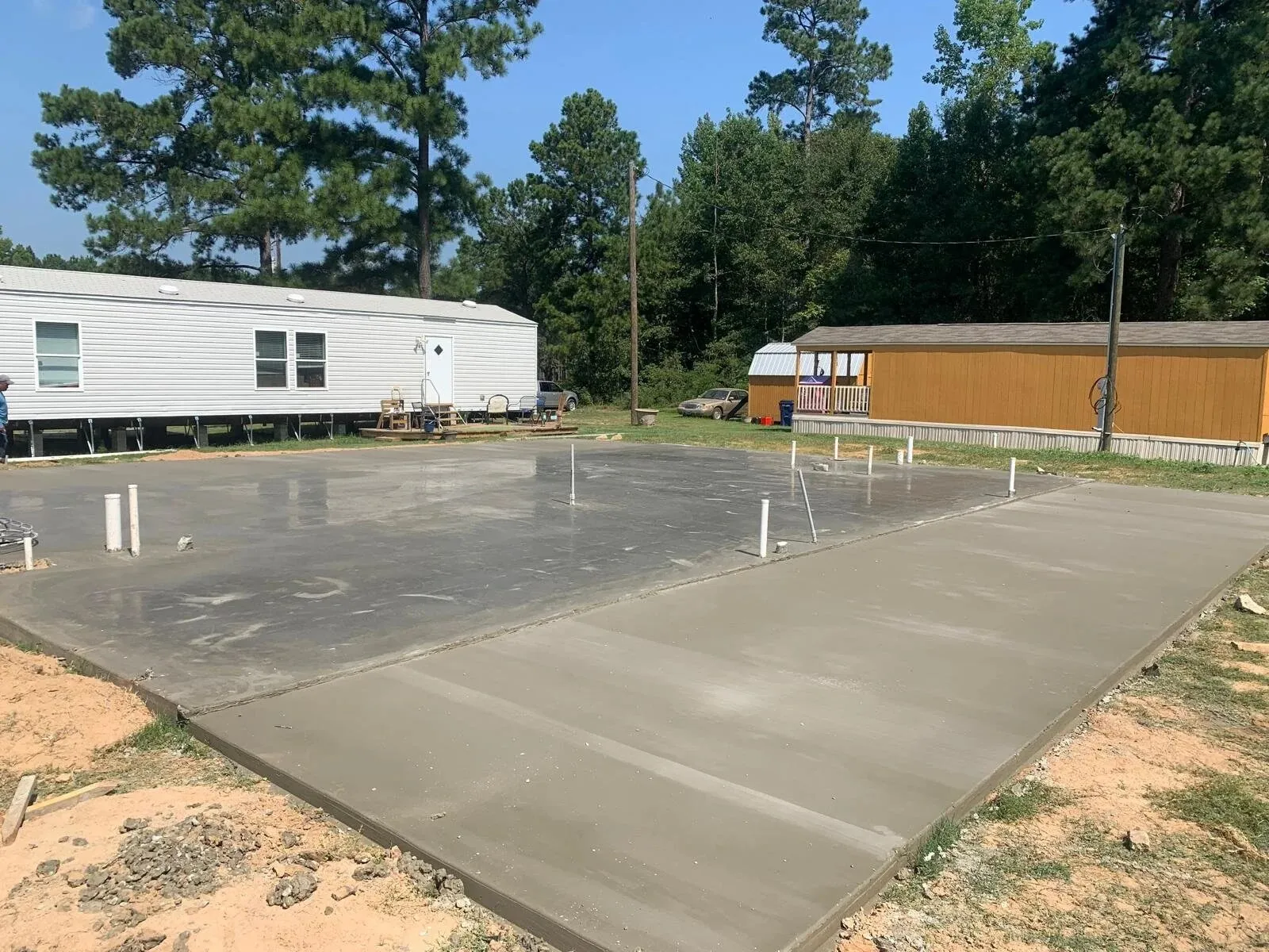 Freshly poured concrete slab on a residential lot